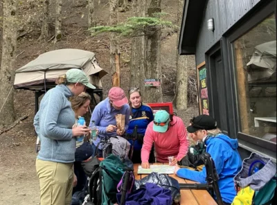 Guide briefing hikers during a Patagonia trekking trip