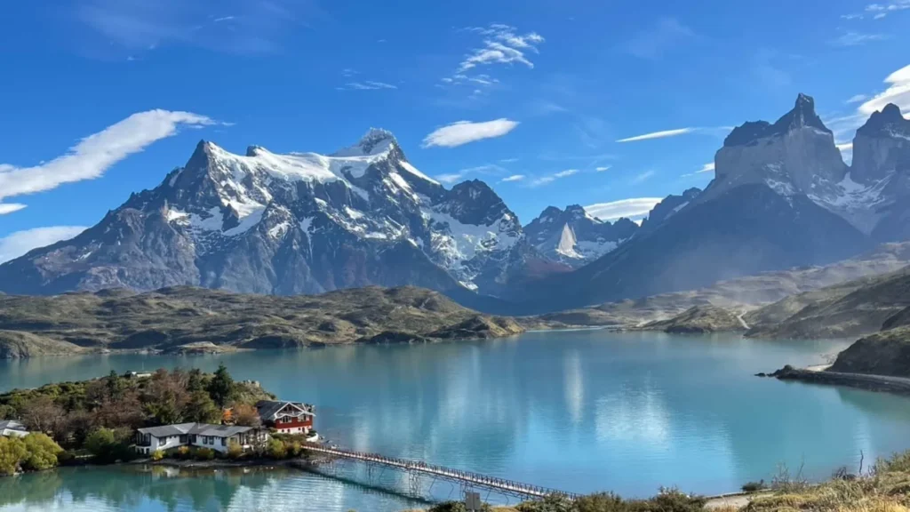 Pehoé Lake lookout with views of Torres del Paine mountains and turquoise water in Patagonia.