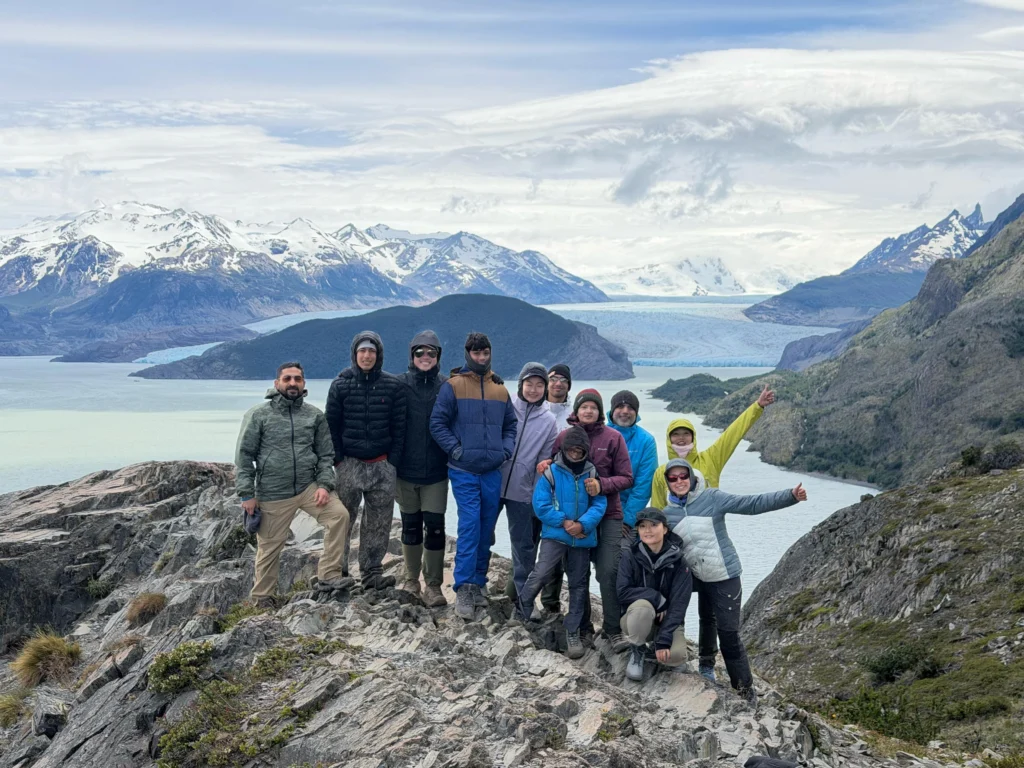 Hikers with views of Grey Glacier and the Southern Patagonian Ice Field in Torres del Paine National Park.
