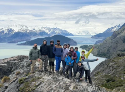 Hikers with views of Grey Glacier and the Southern Patagonian Ice Field in Torres del Paine National Park.