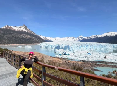 Traveler viewing Perito Moreno Glacier from the walkways in Los Glaciares National Park, Argentina.