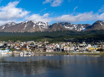 Ushuaia city with mountains and waterfront in Tierra del Fuego, Argentina.