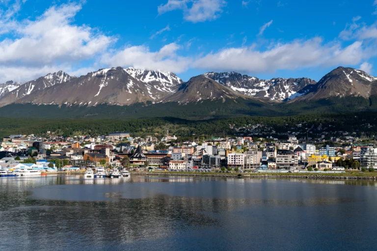 Ushuaia city with mountains and waterfront in Tierra del Fuego, Argentina.