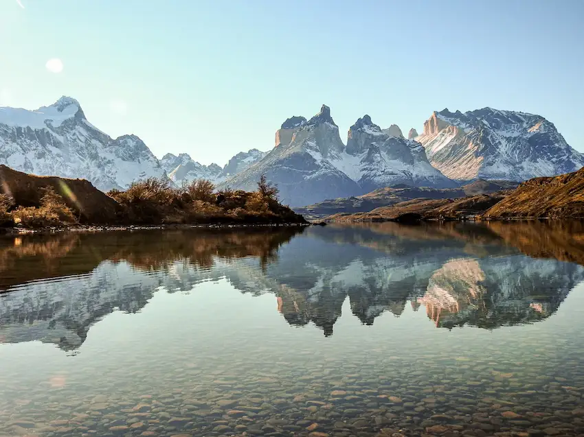 Cuernos del Paine peaks reflected in Lake Pehoé in Torres del Paine National Park, Patagonia