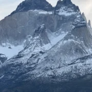 The Cuernos del Paine under winter snow above the lake, Torres del Paine